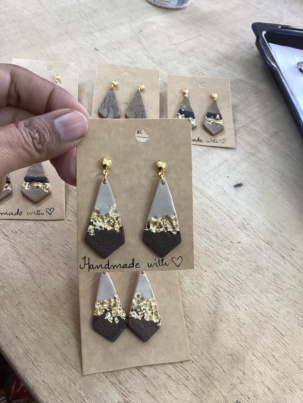 Tricon gold embedded earings