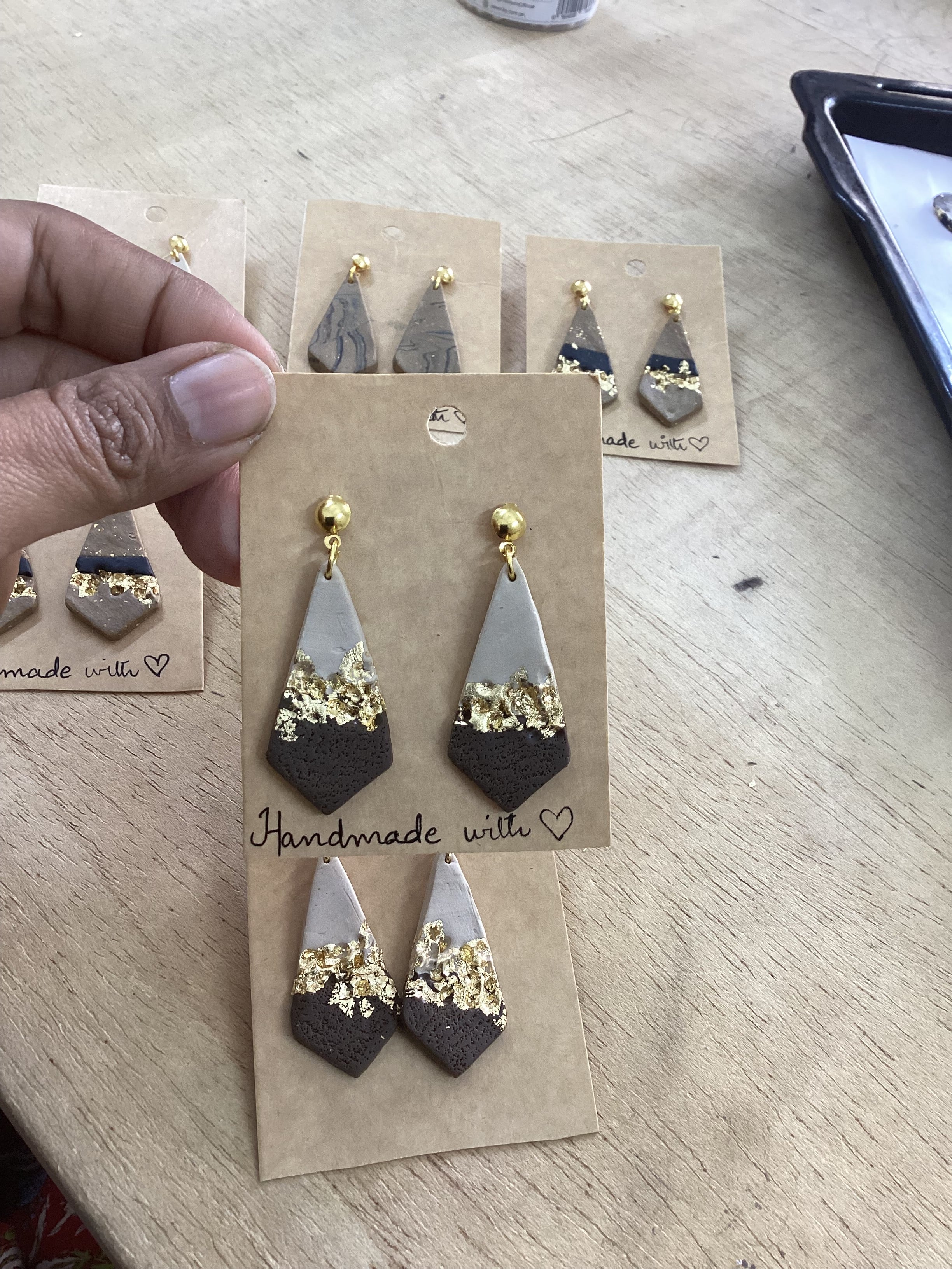 Tricon gold embedded earings